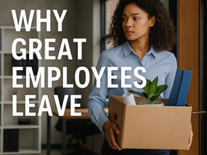 An employee quitting and walking out the door with a box of their stuff in their arms