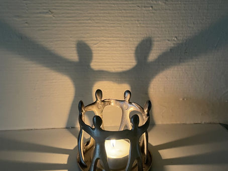 burning candle insight of the candleholder