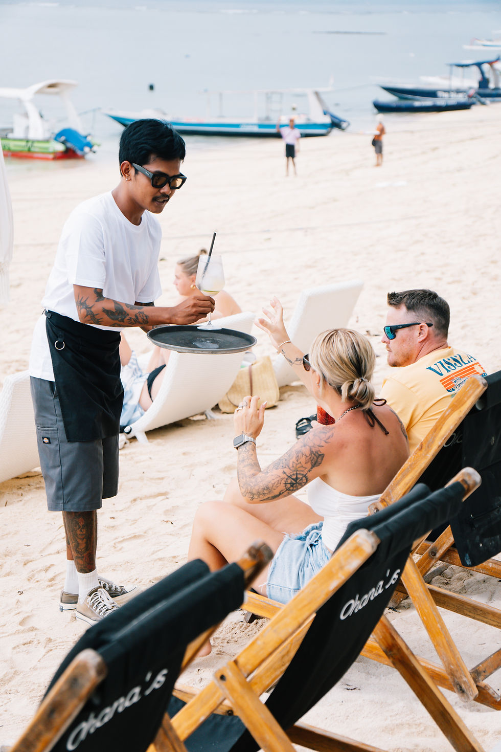 Cocktail service on the sand at Ohana's Beach Club