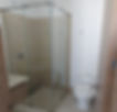 DIVISIÓN DE BAÑO EN ESCUADRA VIDRIO DE 8 MM TEMPLADO CON ACERO INOXIDABLE