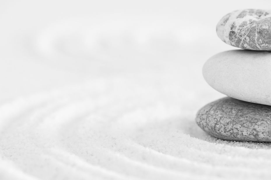 stacked-zen-stones-sand-background-art-of-balance-2022-12-16-00-13-04-utc_edited.jpg