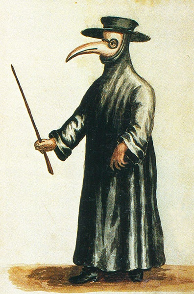 A physician in a 17th-century plague-prevention costume. The beaked mask, waxed robe, gloves, and cane were designed to create distance and filter “bad air” under miasma theory. https://www.camacana.com/en-UK/plague-doctor-mask-history.php