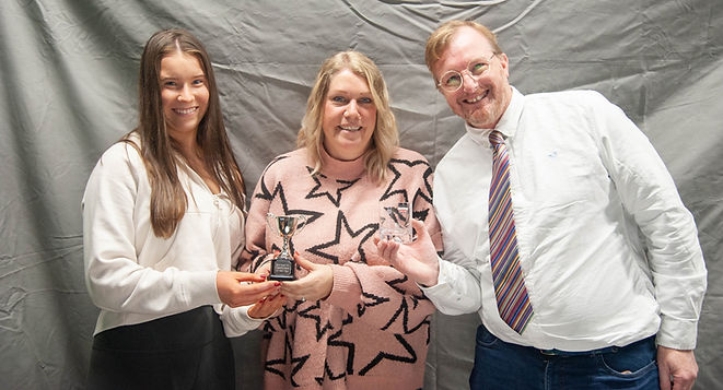 A picture of Elsie, Fiona & Mark from The Northam Care Trust holding the ARC community partner of the year award.