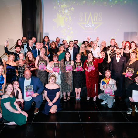 A picture of everyone with their awards at the Stars of LD & A Awards 2025