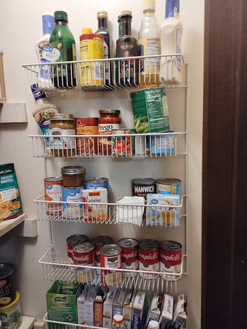 unorganized pantry wall rack