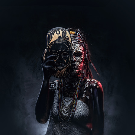 portrait-of-scary-african-shaman-female-with-petrified-cracked-skin-and-dreadlocks-holds-t