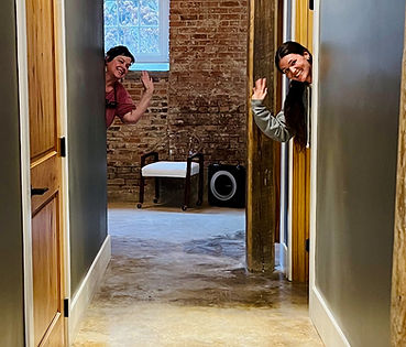 Jenny & Rachel waving from their studios!