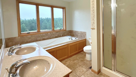 Primary Bathroom with neutral color tones.