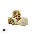 An image of Frozen chicken momos with a soft, beige-colored dough. One momo is cut in half, displaying a filling of minced chicken and finely chopped green herbs, with a moist and textured look. The other momos are intact, their pleated tops indicating a handcrafted touch. They are set against a white background, which accentuates the subtle color and texture of the momos, with the 'April 3rd Foods