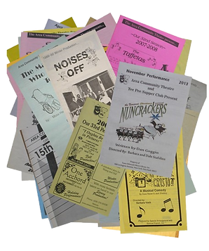 playbills_pile-removebg-preview.png