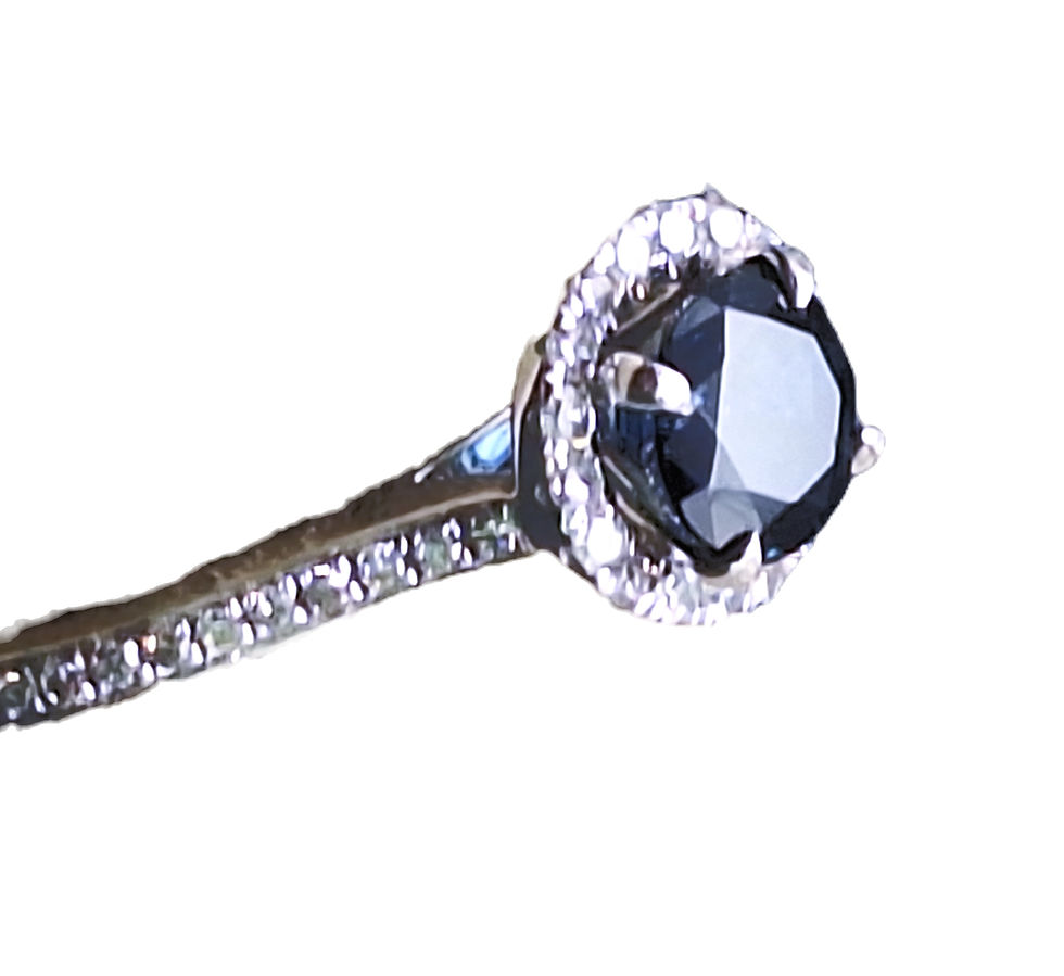 Thumbnail: 14k white micro pave set diamonds encircling a blue sapphire.