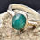 Thumbnail: A Glorious Green Oval Emerald in sterling silver