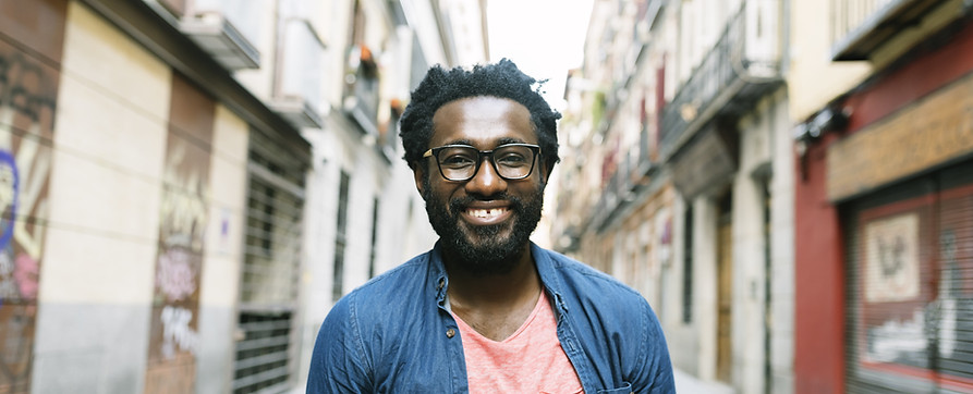 Smiling Man with Glasses
