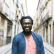 Smiling Man with Glasses