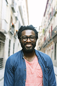 Smiling Man with Glasses