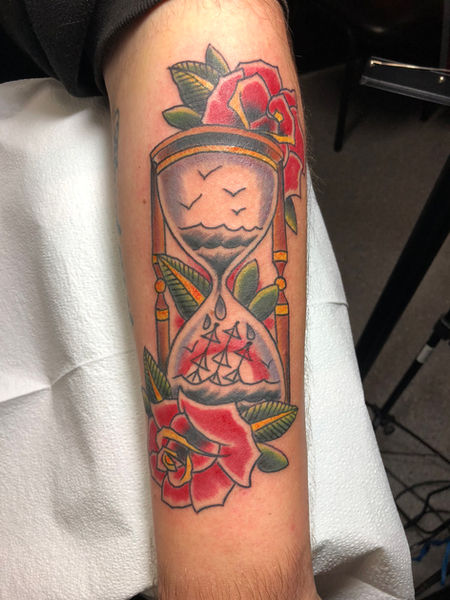 steven anderson 920 tattoo company oshkosh wisconsin traditional western Americana tattoo color ship in a bottle hourglass with roses tattoo
