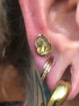 Piercings by molly moon molly moon 920 tattoo and piercing 920 tattoo 920 oshkosh downtown oshkosh piercer body piercer body piercing 920 tattoo co wisconsin piercer wisconsin fine jewelry piercing piercings gold jewelry rose gold jewelry gold hoops rutilated quartz ear piercings