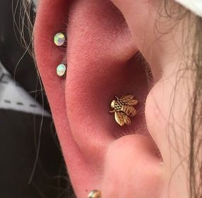 Piercings by molly moon molly moon 920 tattoo and piercing 920 tattoo 920 oshkosh downtown oshkosh piercer body piercer body piercing 920 tattoo co wisconsin piercer wisconsin fine jewelry piercing piercings conch piercing bee bee jewelry helix piercing double helix piercing white opals gold jewelry