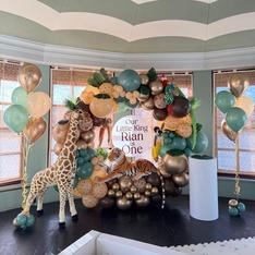 1st birthday balloon arch in safari theme