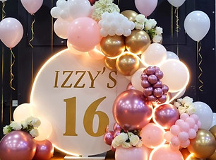 white personalised balloon backdrop for sweet 16