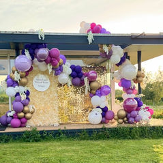 Stage balloon decorations for the charity event in Guildford