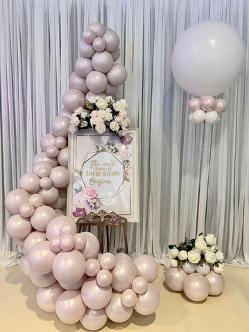 Wedding Welcome Sign with balloon garland, created by top wedding balloon decorators - Confetti Party, based in Guildford