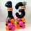 Thumbnail: neon balloons stack with black balloon number 13