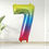 Thumbnail: Rainbow number 7 helium balloon for delivery in Guildford