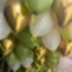 natural baby shower ceiling balloons in white, gold and eucalyptus colours