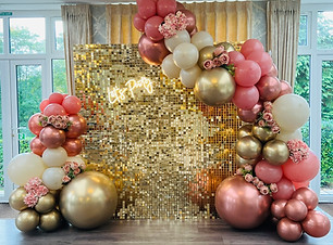 Balloon-gatland-with-foliage-and-shimmer-wall-Guildford-Confetti-Party.jpg