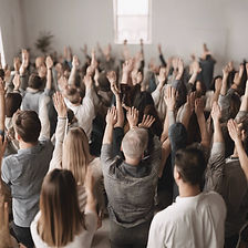 a group of people worshiping.jpg