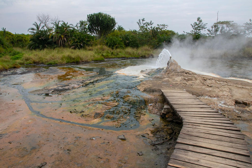 Sempaya Hot Springs geyser during Uganda Safaris tour.
