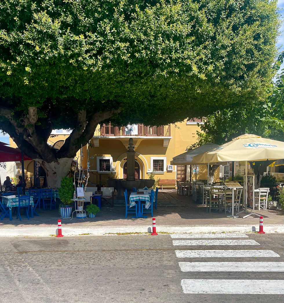filoxenia at village square in Rhodes Greece