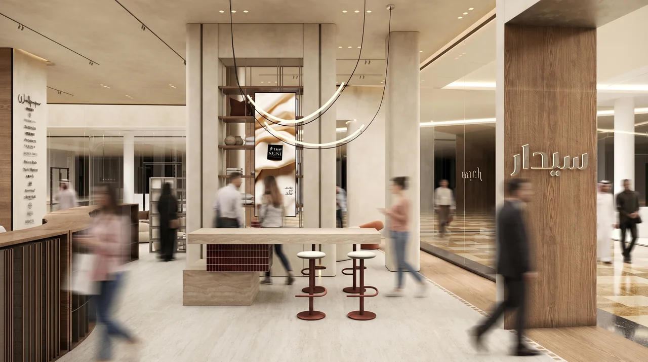 Sedar textile showroom with tall material displays, curved furniture and a central circulation route.