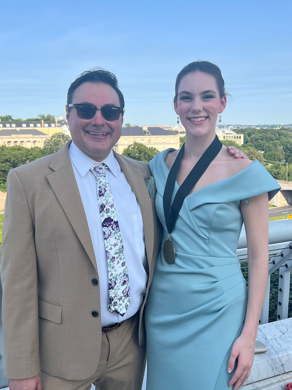 South Lakes High School Theatre director Mike Viola with Alden Walcott, who won the Rising Critic award for her reviews of local high school theatre productions.