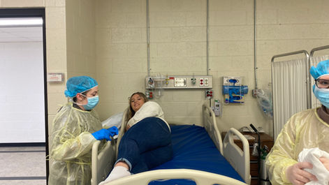Practical Nursing practicing PPE, bed making and transfers.