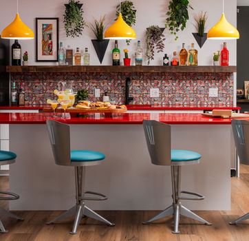 Interior design photography and video. Red yellow teal color design.