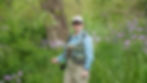 Woman holding a fly rod