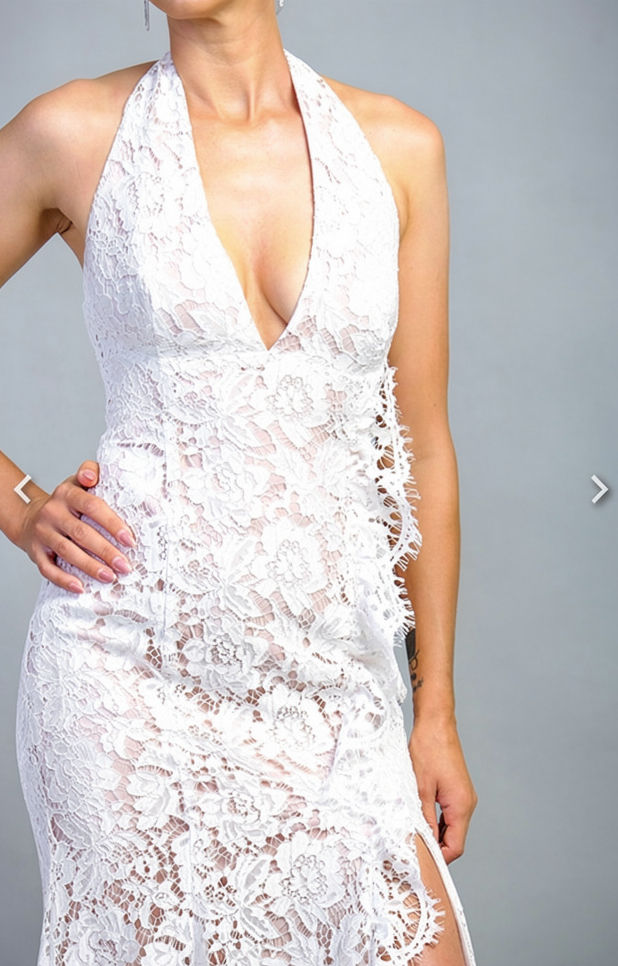 Thumbnail: Woman in white floral lace halter dress, V-neck, side slit