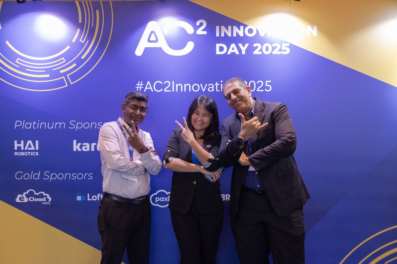 MYDIN team and AC2 team celebrating 