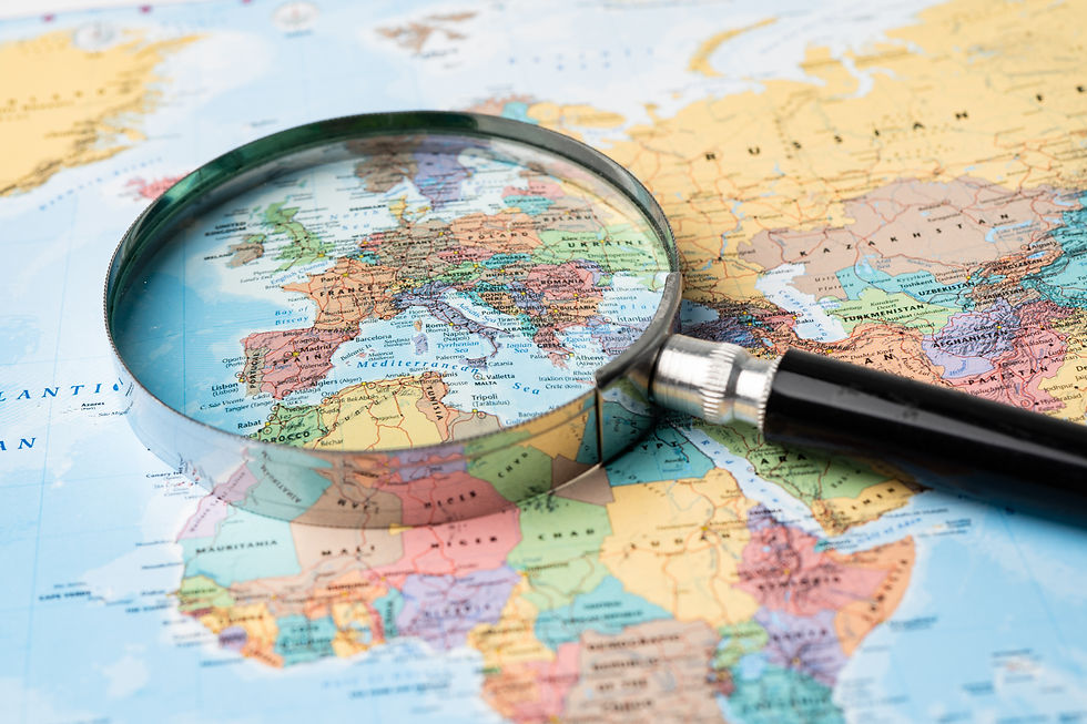 vecteezy_europe-magnifying-glass-close-up-with-colorful-world-map_3173289.jpg