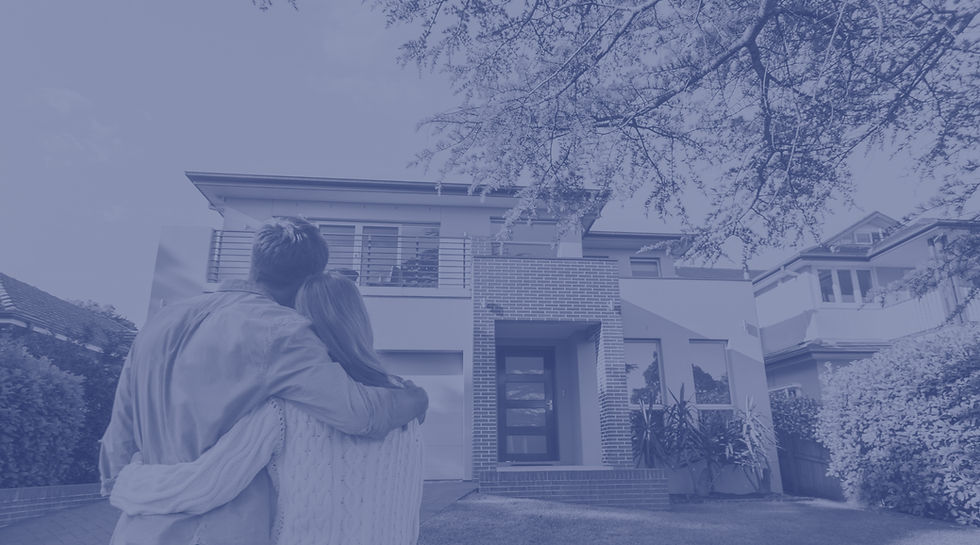 Couple in Front of a House