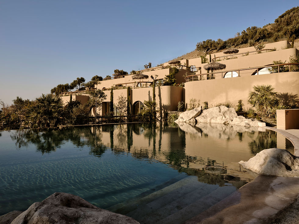 tella_thera_pool_view_east_wing.jpg