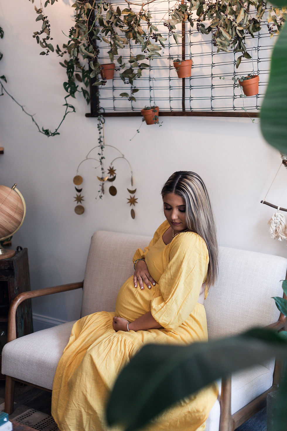 a studio garden themed maternity portrait session