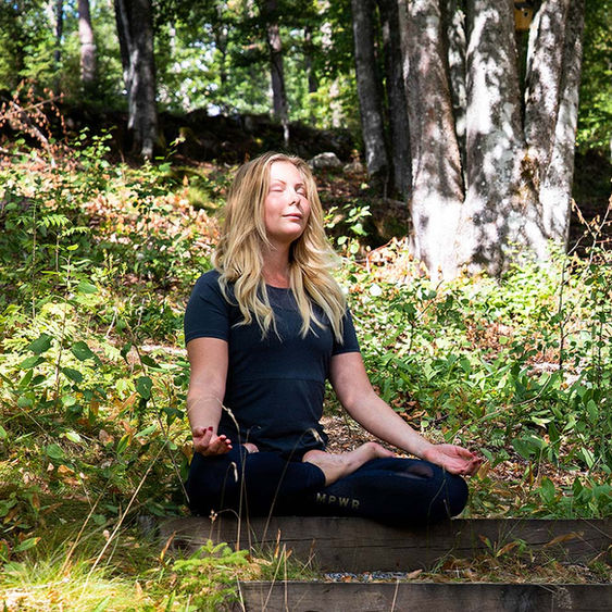 Woman meditating in nature