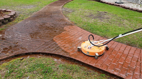 Stamped concrete walkway with high amount of dirt and algae.
Surface cleaning