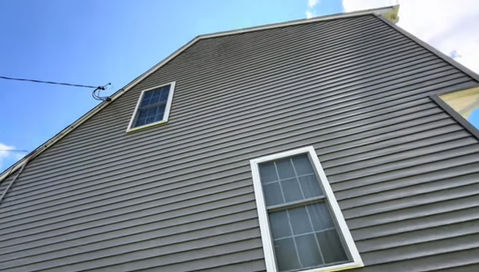 Aluminum siding cleaned that had
lichen on sections.