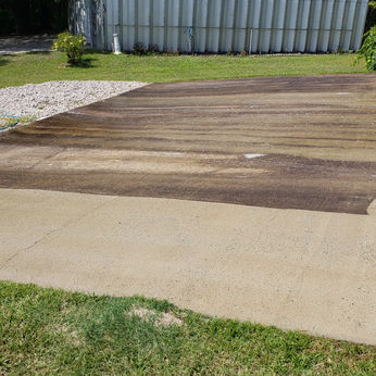 Front drive up patio to storage station/ surfaced cleaned by The Palms Pressure Washing