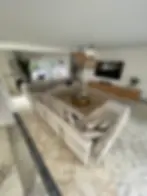 Modern living room with U-shaped sofa