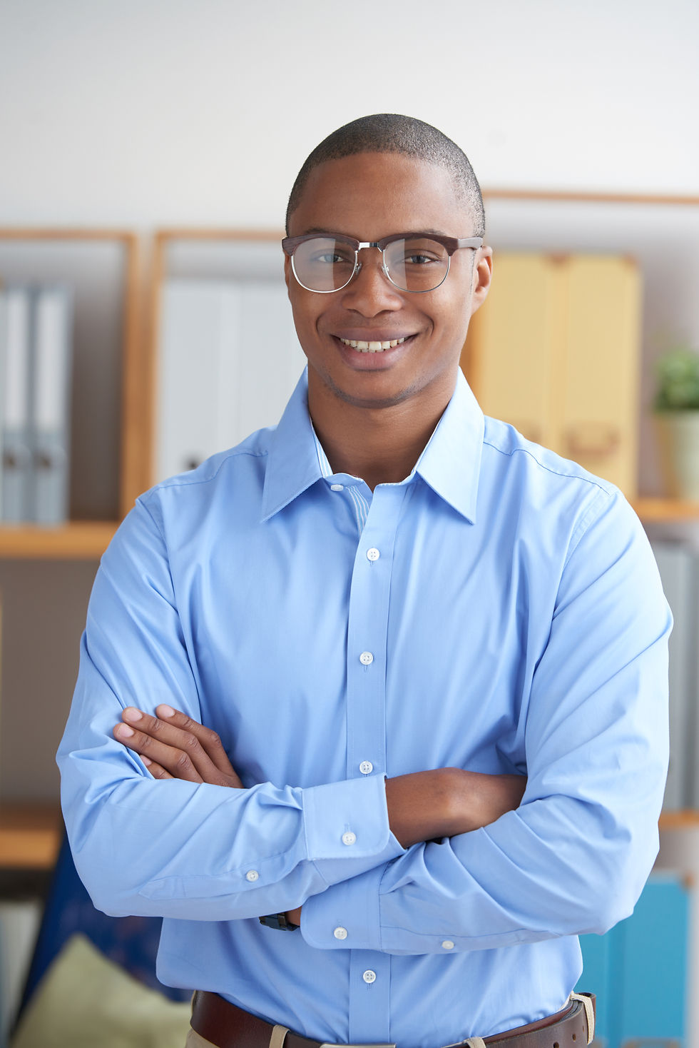 confident-entrepreneur-looking-camera-with-arms-folded-smiling.jpg